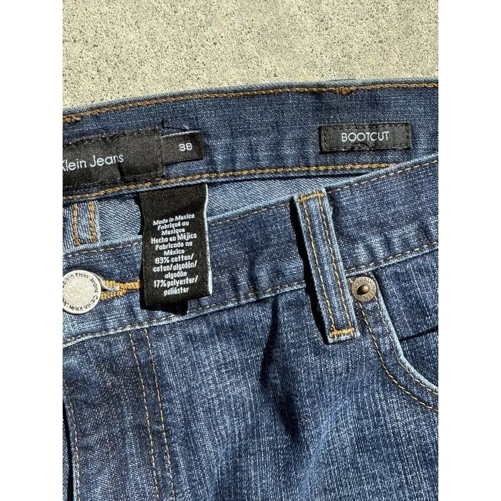Calvin Klein Jeans Straight-Leg Indigo Denim With Brown Patch